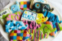 Biscuits decorated to look like Elmer with icing
