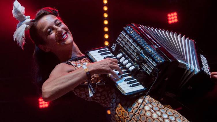 Woman playing the accordian