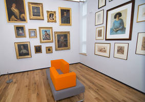 Cooper Gallery museum indoors with portraits on the walls and comfortable seating