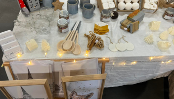 A selection of homeware items, such as candles, ornaments and artworks on display.