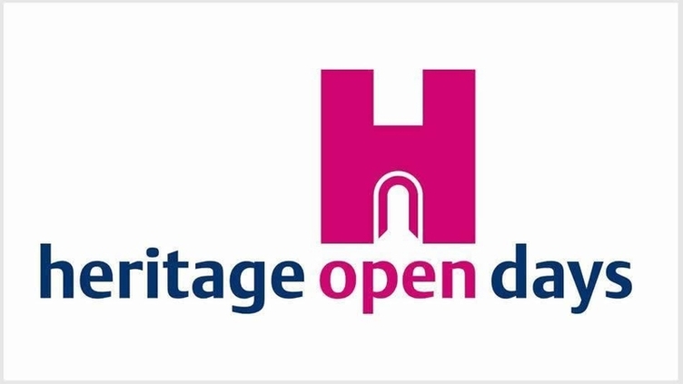 "Logo for 'Heritage Open Days' featuring the words 'heritage' and 'days' in blue and 'open' in pink. Above the text is a large pink letter 'H' with an archway design integrated into it.